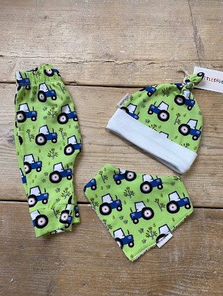 Express Stitch & Littlesnug Organic Hand Made Baby Clothing