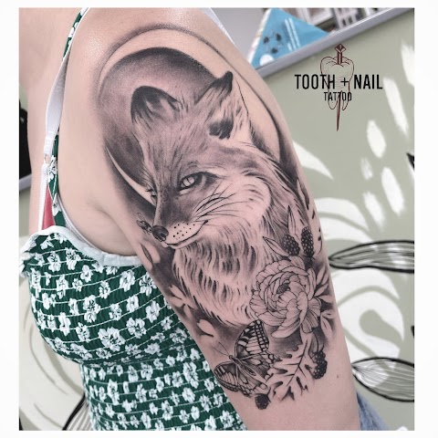 Tooth and Nail Tattoo