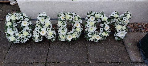 Busy Blooms for wedding & funeral Florist