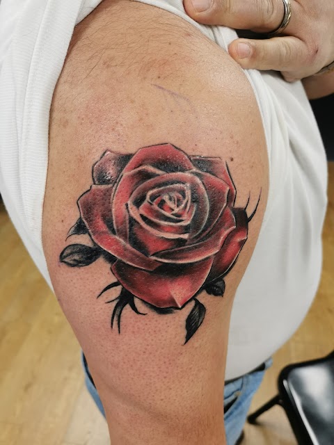 Ruby Red Tattoo Studio