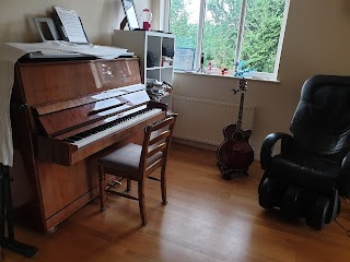 Rob's Music School - Singing, Piano, Guitar, Ukulele