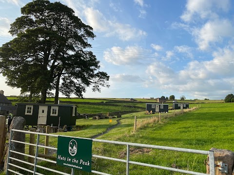 Huts In The Peak