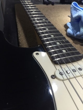 Planet Guitar - Guitar Repair & Guitar Tuition