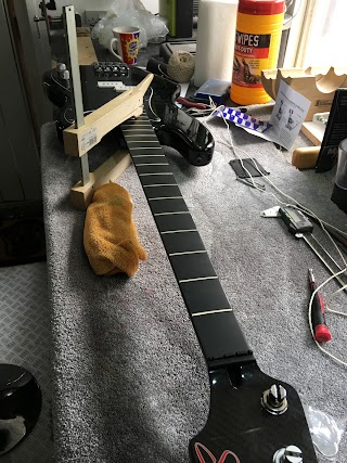 Planet Guitar - Guitar Repair & Guitar Tuition