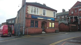 WOOLLISCROFTS SOLICITORS LIMITED incorporating Edward Hollinshead