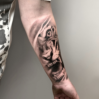 Faine Tattoo