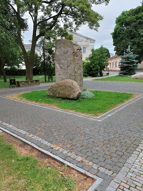 Boulder with sculpture