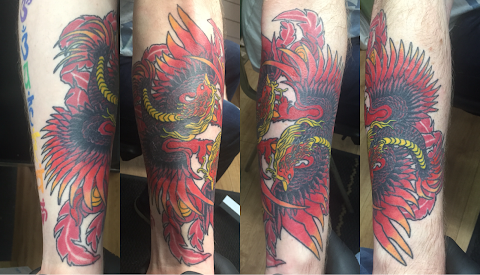 Ink & Skin Custom Tattoos & Piercing - Birr