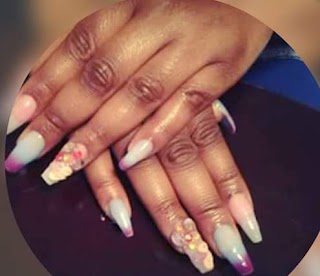 Phoenmal Woman Body Scrub and Braids an Manicures Llc