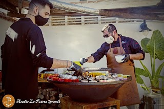 Restaurante La Puerta Grande / Junto Balneario de Leana