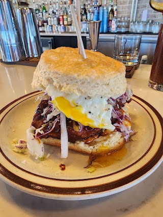 Atomic Cowboy home of Denver Biscuit Co & Fat Sully's NY Pizza