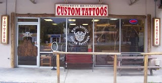 White Buffalo Arts Custom Tattoos & Piercing