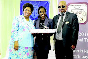 HONOURED: Nina Maseko from Eqinisweni Secondary School with    Ivory Park Taxi Association chairman Johannes Mkhonza and  Basic Education Minister Angie Motshekga  Photo: Thulani Mbele