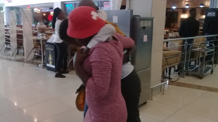 The Queens High School pupil is reunited with his family at Maponya Mall in Soweto on February 26 2020.