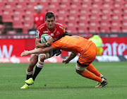 Harold Vorster of the Lions tackled by Tomas Lezana of the Jaguares during the 2018 Super Rugby match between the Lions and Jaguares at Ellis Park, Johannesburg on 24 February 2018.