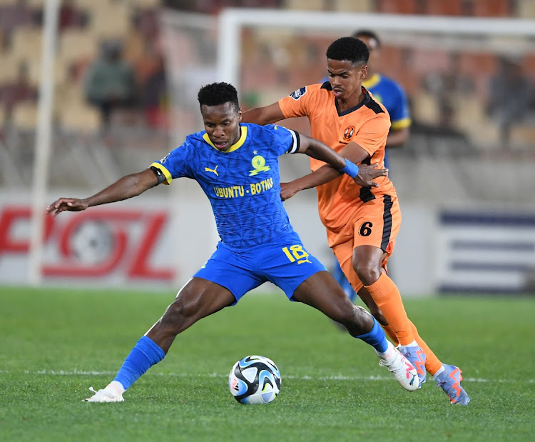 Themba Zwane of Mamelodi Sundowns and Luciano Van Heerden of Polokwane City during the DStv Premiership match yesterday.