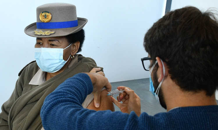 A traffic officer receives a Covid-19 vaccination at the Moreleta Park Gemeente Kerk in Pretoria on Wednesday. The officer was one of 194,000 people to get the jab on Wednesday, and one of more than 7-million to have received the shot across SA to date.
