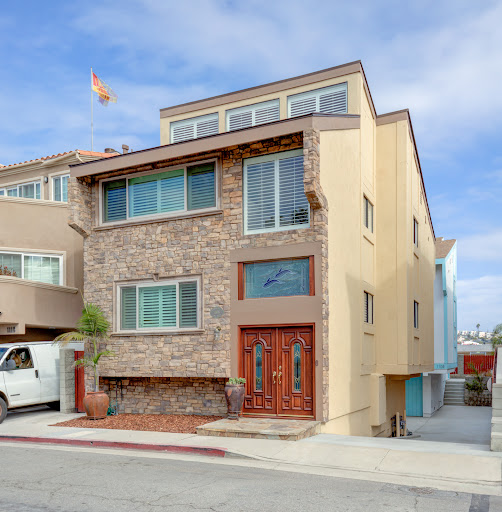 Modern house facade stone and beige in this luxury house for rent in Hermosa Beach ($9,400)