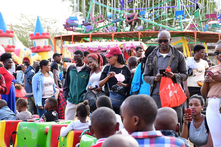 Parents overseeing their children at a section of the entertainment arena at the 2019 Nairobi International Trade Fair