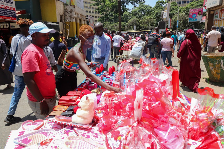 Hawkers allowed by the Nairobi County government to sell flowers outside National Archives ahead of valentines day celebrations on February 13, 2023.