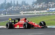 The car in action with Jean Alesi at the wheel