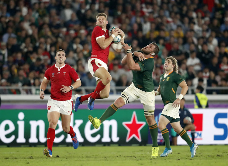 Wales' Dan Biggar in action with South Africa's Duane Vermeulen.