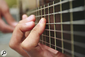 It's relatively difficult to fix fret noises with processsing, due to the very specific nature of the transients produced. For this reason, it's always advisable to record several takes of an important guitar part.