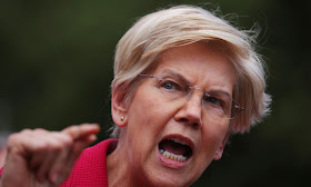 Elizabeth Warren Says Fed Chair Powell Took 'Flamethrower' to Bank Regulations