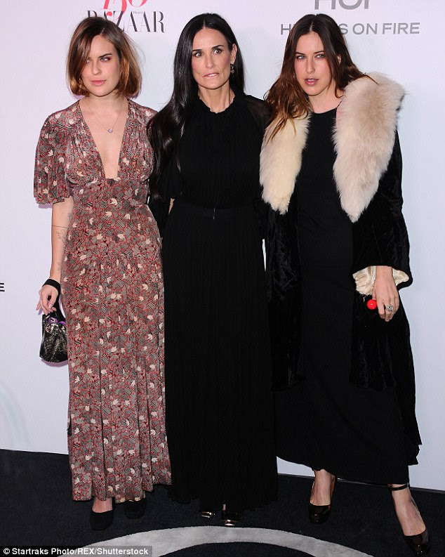 The ladies on the town: Moore with Tallulah and Scout at Harper's Bazaar 150 Most Fashionable Woman Cocktail party, Los Angeles in January