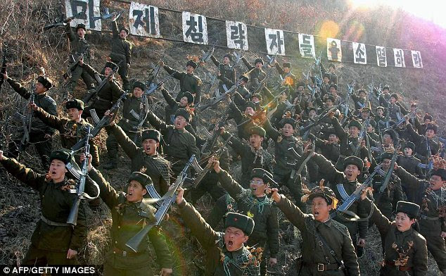 Warlike: North Korean members of the Worker-Peasant Red Guards shouting anti-U.S. slogans