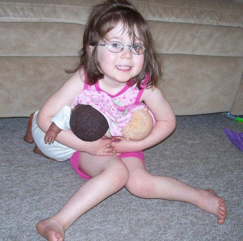 http://www.breastfeedingbasics.com/wp-content/uploads/2011/07/Little-girl-nursing-dolls.jpg