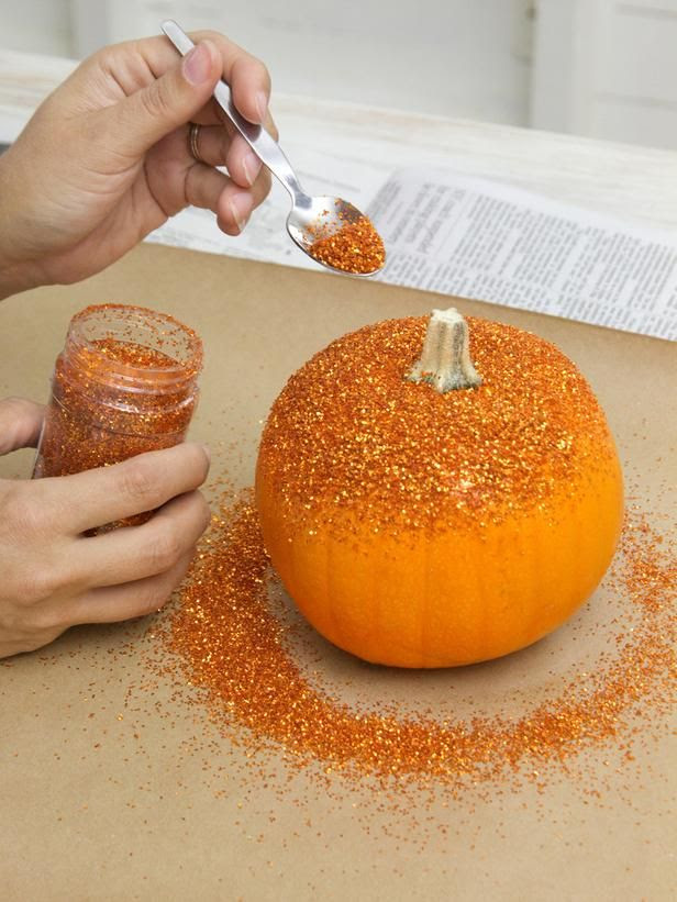 Glitter Pumpkins...these are so easy to do and so beautiful! I did this last fall with white pumpkins and black glitter! just spray glue on pumpkin and sprinkle with glitter! Gorgeous!
