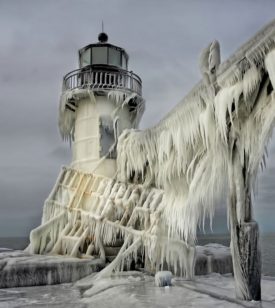 http://www.boredpanda.com/flozen-lighthouses-on-lake-michigan-shore/
