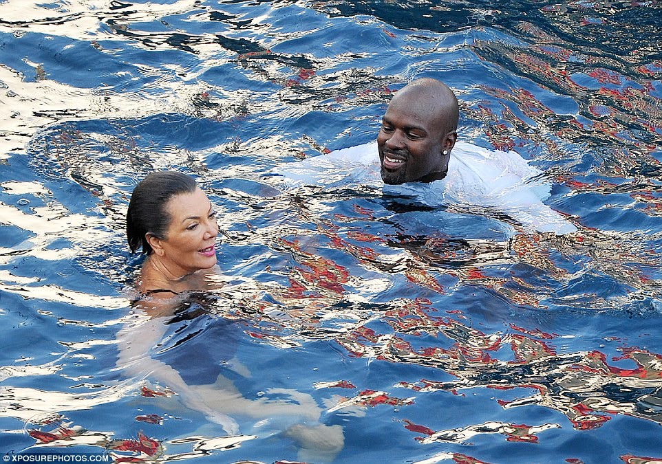 Having fun: The reality TV matriarch chatted with Corey as he went for a swim with his shirt on