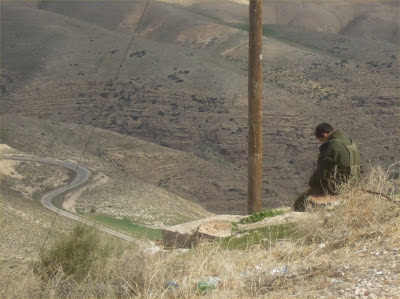 guard duty israel planet kfar adumim allon bored stiff soldier road background