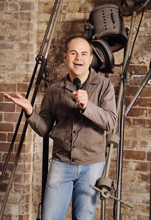 Yianni Zinonos, TVS Presenter Yianni Studio with lights and mic, PR portrait