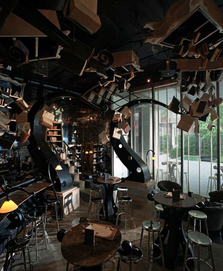 The BookShop Restaurant - @Cait I picture an area something like this, only less creepy and not so damaging to the books.
