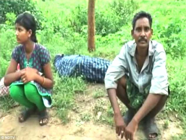 Image result for orissa man carries his dead wife on his shoulder