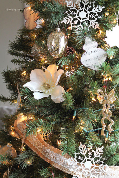 For a more subtle look, use muted colors to complement your evergreen. 
See more at Love Grows Wild »
