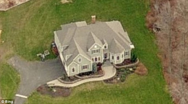 Nancy Lanza's home in Newtown, Connecticut, was raided after 2 pm on Friday and she was found shot dead from an apparent gunshot wound to the face