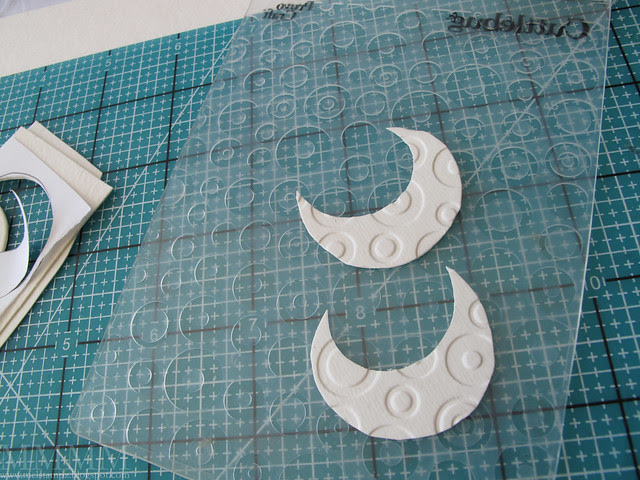10 Pressure emboss the moons for texture