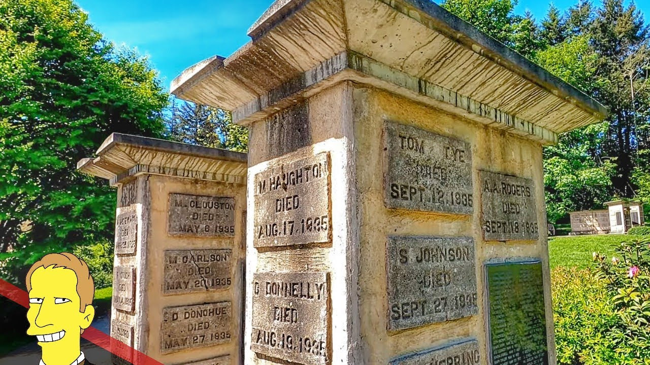 stone gravestones set onto memorial markers commemorating provincial hospital for the insane in New Westminster British Columbia