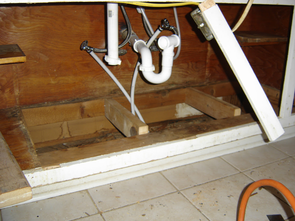 cost to replace cabinet floor under kitchen sink