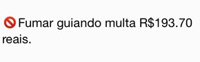 Mensagem sobre fumar guiando o carro (Foto: Reprodução)