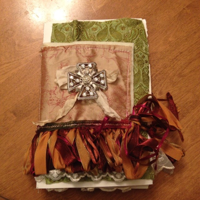 The journal I made this weekend. More photos to follow. It isn't finished but it will be Victorian Christmas themed.
