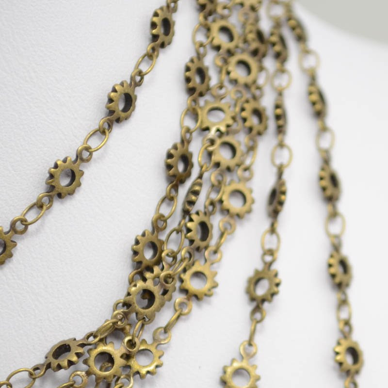 s40265 Chain - 5 mm Sunburst Chain - Antiqued Gold (Inch)
