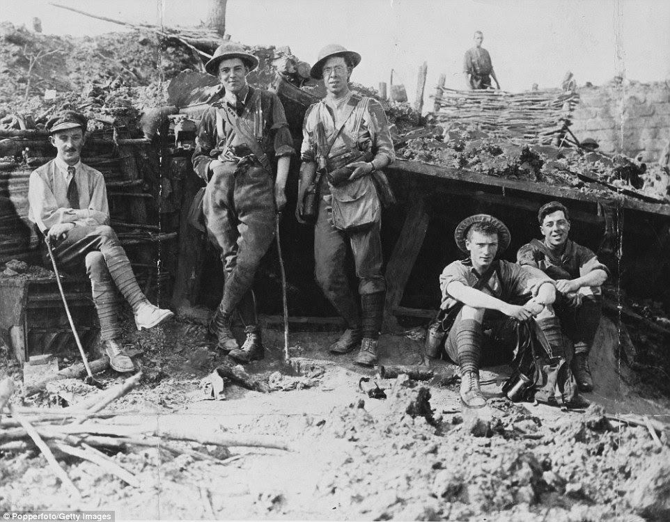 British observers are pictured at a captured German observation post after an advance on the Messines Ridge during the Battle of Messines, in June 1917. Because the Germans held the position for so long (from late 1914 to 7 June 1917) they were able to build a network of trenches fortified like few others