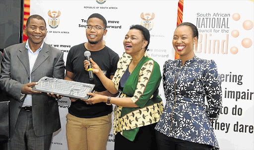 NOTED: Chairman of parliament's portfolio committee on communications Humphrey Maxegwana, Siyabonga Mlotshwa, Deputy Minister of Telecommunications and Postal Services Hlengiwe Mkhize and Deputy Minister of Communications Stella Ndabeni-Abrahams.