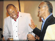 Kenneth Diedricks and lawyer Vas Soni at Diedricks's 40th birthday party at the Saxon in 2012. Soni would be appointed South Africa's anti-corruption boss the next year