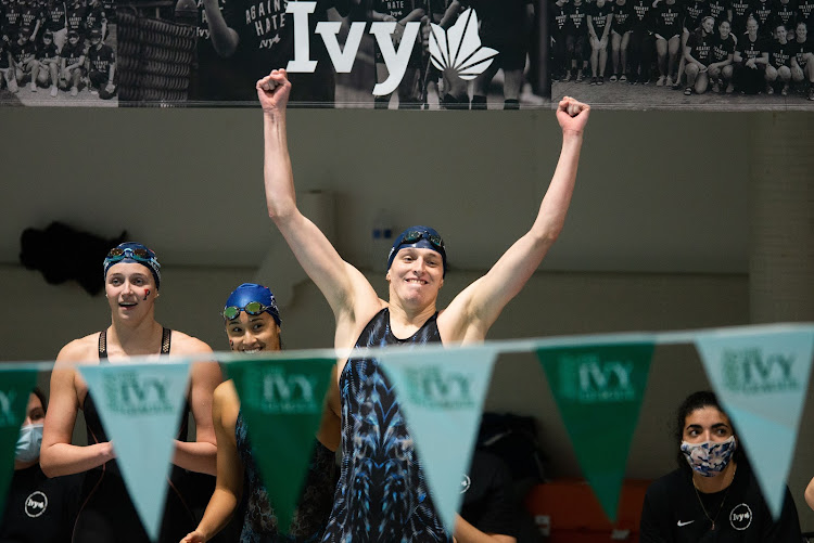 University of Pennsylvania swimmer Lia Thomas reacts after her team wins the 400 yard freestyle relay during the 2022 Ivy League Women's Swimming and Diving Championships at Blodgett Pool on February 19, 2022 in Cambridge, Massachusetts